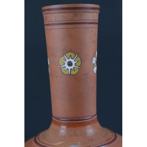 21 - 19th Century Victorian Watcombe terracotta and enamel bottle vase being decorated with floral enamel... 