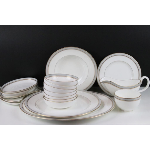 25 - Royal Worcester Howard pattern dinner service having grey and gilt rims. The lot to include two grav... 