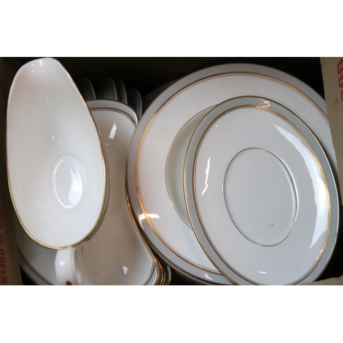 25 - Royal Worcester Howard pattern dinner service having grey and gilt rims. The lot to include two grav... 