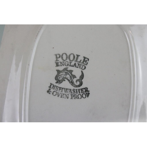 27 - Poole 1970s two tone dinner service having a mottled grey exterior and blue interior. Stamped marks ... 