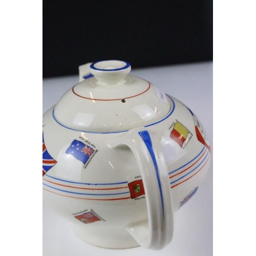 3 - Crown Ducal WWII second world war commemorative teapot. The teapot decorated with flags and a centra... 