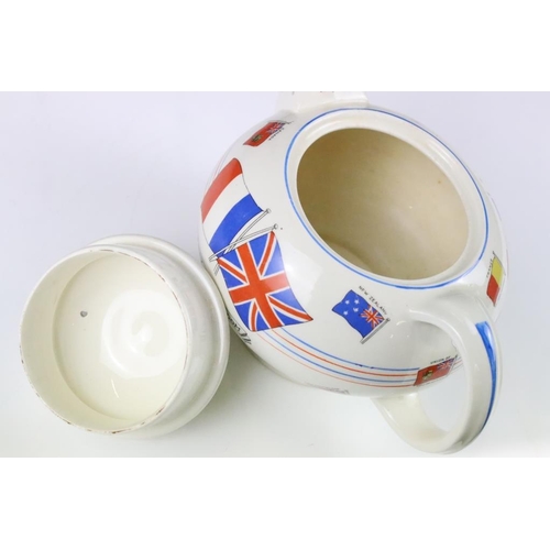 3 - Crown Ducal WWII second world war commemorative teapot. The teapot decorated with flags and a centra... 