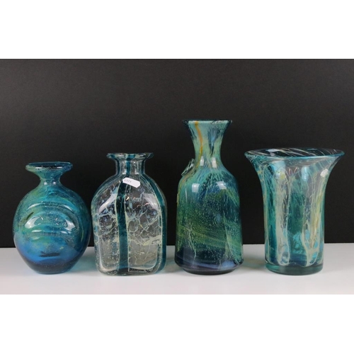 30 - Four Mdina glass vases to include crystal blue stripe pattern vases, and two in the blue summer patt... 