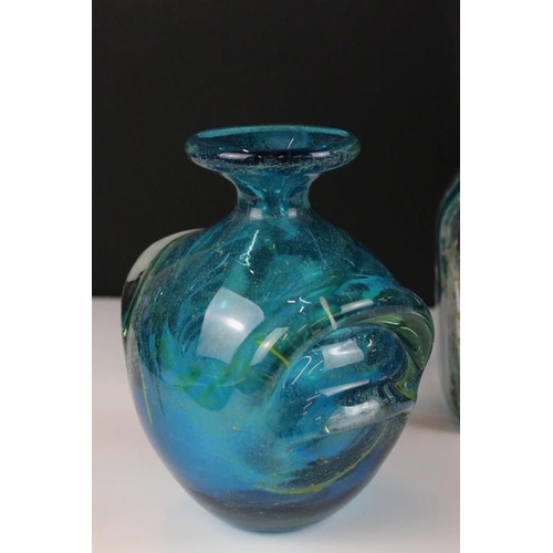 30 - Four Mdina glass vases to include crystal blue stripe pattern vases, and two in the blue summer patt... 