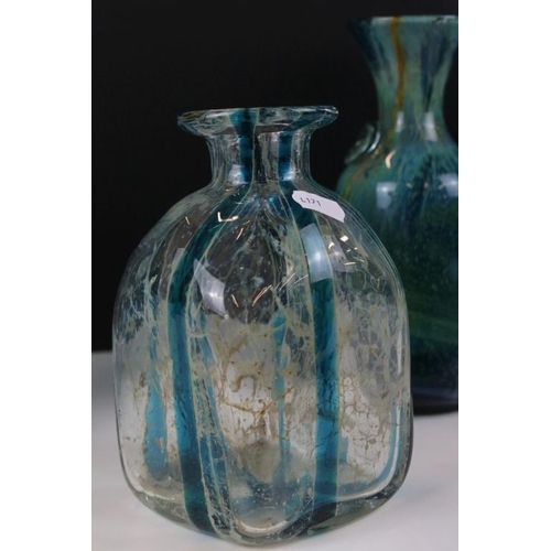 30 - Four Mdina glass vases to include crystal blue stripe pattern vases, and two in the blue summer patt... 