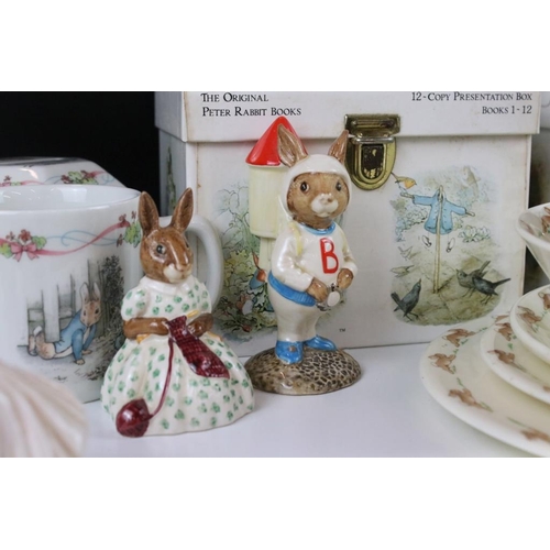 44 - Assorted Beatrix Potter and bunnykins ceramics and books to include Royal Doulton figures, bunnykins... 