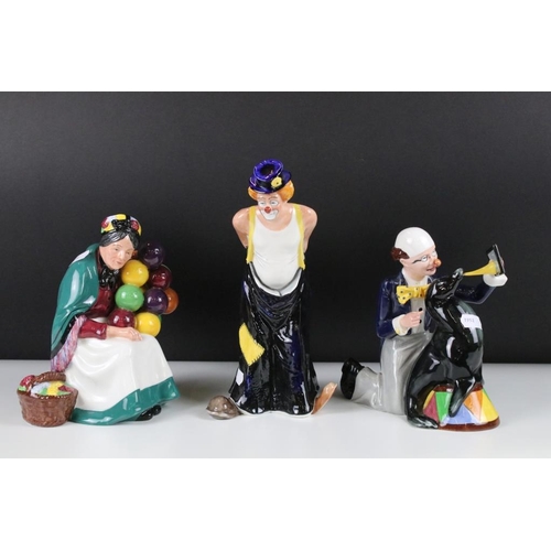 45 - Three Royal Doulton figurines to include 'The Old Balloon Seller' HN1315, Tip Toe HN3293 and Partner... 