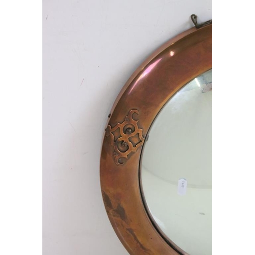 478 - Arts and Crafts Copper Round Framed Convex Mirror with strapwork decoration, 46cm diameter