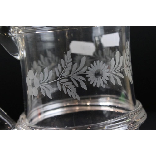 48 - Late Georgian glass tankard of two tier construction having etched floral, grape vine and wheat shea... 