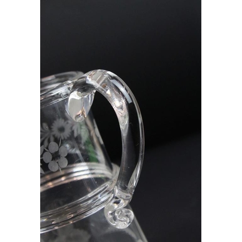 48 - Late Georgian glass tankard of two tier construction having etched floral, grape vine and wheat shea... 