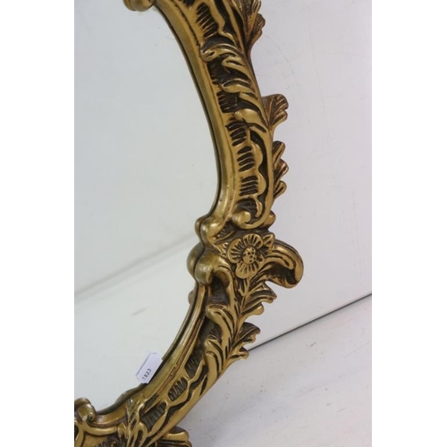 482 - 20th century Plaster Gilt Framed Oval Mirror in the Rococo style, 47cm x 62cm