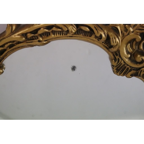 482 - 20th century Plaster Gilt Framed Oval Mirror in the Rococo style, 47cm x 62cm