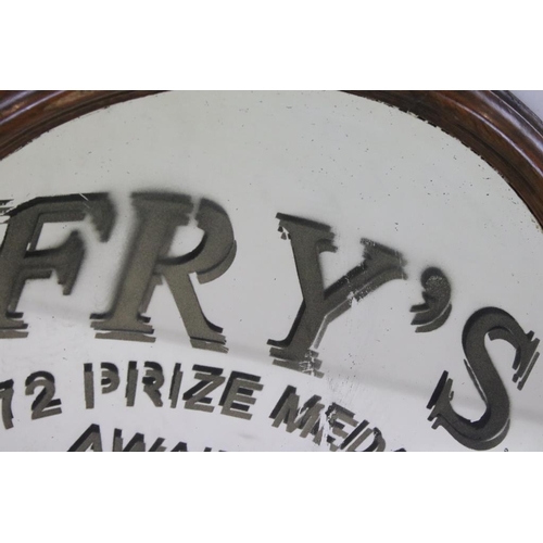 484 - Oak Framed Bevelled Edge Circular Advertising style Wall Mirror marked ' Fry's, 72 Prize Medal award... 