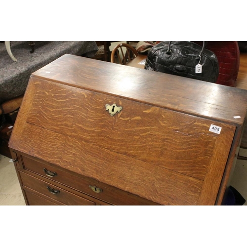 495 - George III Oak Bureau, the fall front opening to a fitted interior, over two short and three long dr... 