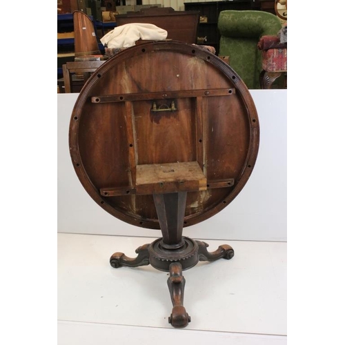 498 - Mid Victorian Mahogany Circular Tilt Top Loo Table, raised on carved centre column with three scroll... 