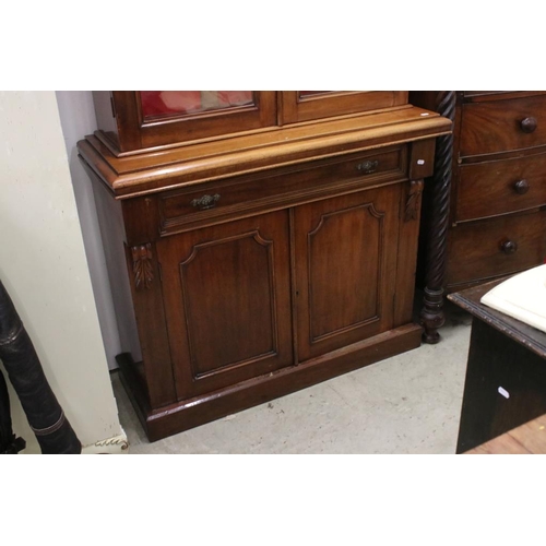 504 - 19th century Mahogany Bookcase Cupboard, the upper section with two glazed doors opening to three ad... 