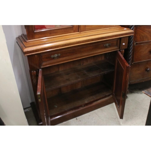 504 - 19th century Mahogany Bookcase Cupboard, the upper section with two glazed doors opening to three ad... 