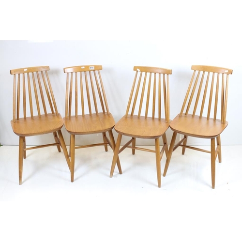 515 - Set of Four Mid century Stick-back Kitchen Chairs, each 51cm wide x 82cm high