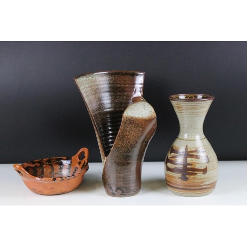 52 - Collection of pottery to include a studio pottery vase signed by George H Wilson, a fared rim potter... 