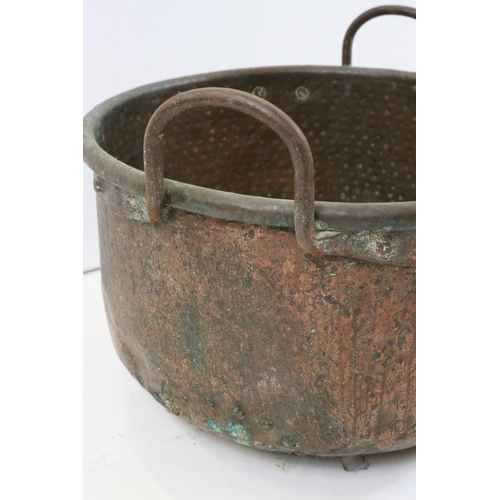 524 - Large 19th / Early 20th century Copper Hammered Cooking Pot with iron loop handles, 45cm diameter x ... 