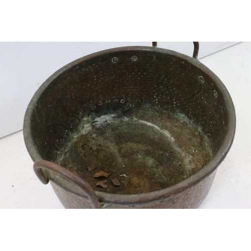 524 - Large 19th / Early 20th century Copper Hammered Cooking Pot with iron loop handles, 45cm diameter x ... 