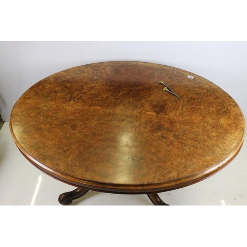 533 - Victorian Burr Walnut Oval Tilt Top Breakfast Table raised on turned bulbous pillar with four carved... 