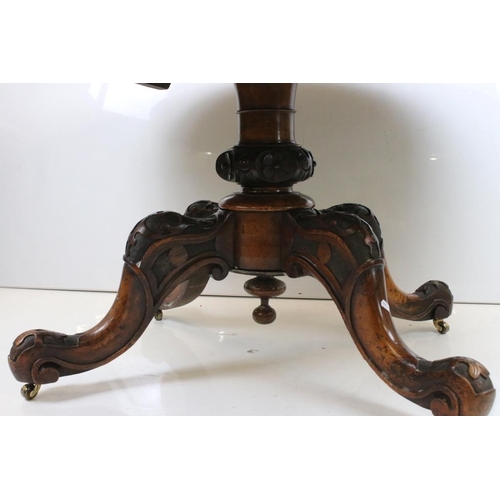 533 - Victorian Burr Walnut Oval Tilt Top Breakfast Table raised on turned bulbous pillar with four carved... 