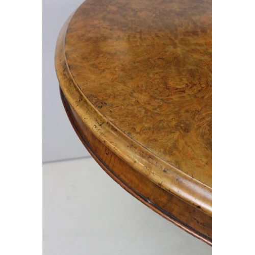 533 - Victorian Burr Walnut Oval Tilt Top Breakfast Table raised on turned bulbous pillar with four carved... 