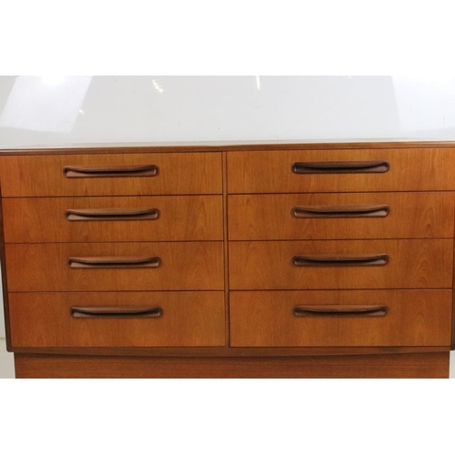 544 - Mid century Retro G-plan ' Fresco ' Double Bank of Eight Drawers with roll-over handles, raised on a... 