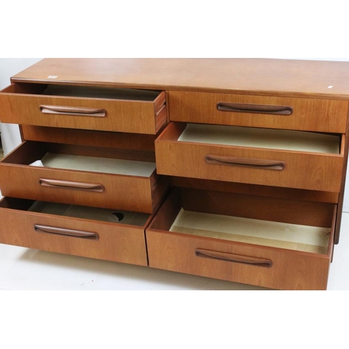 544 - Mid century Retro G-plan ' Fresco ' Double Bank of Eight Drawers with roll-over handles, raised on a... 