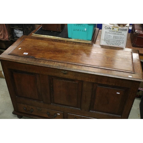 552 - 18th century Oak Mule Chest, the hinged lid above a three panel front with two drawers below, 126cm ... 