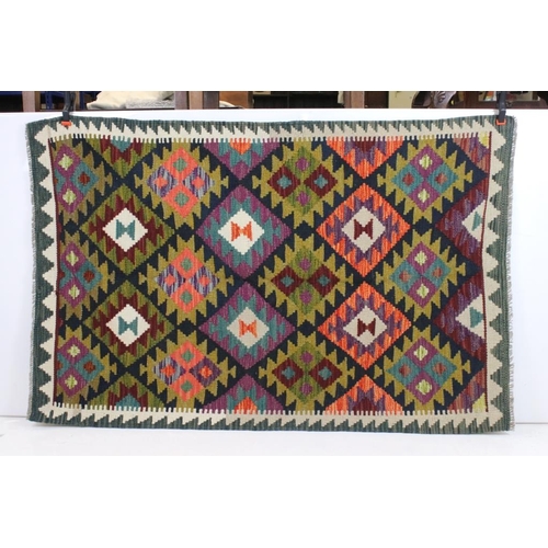 556 - Hand Knotted Woolen Maimana Rug, 155cm x 100cm