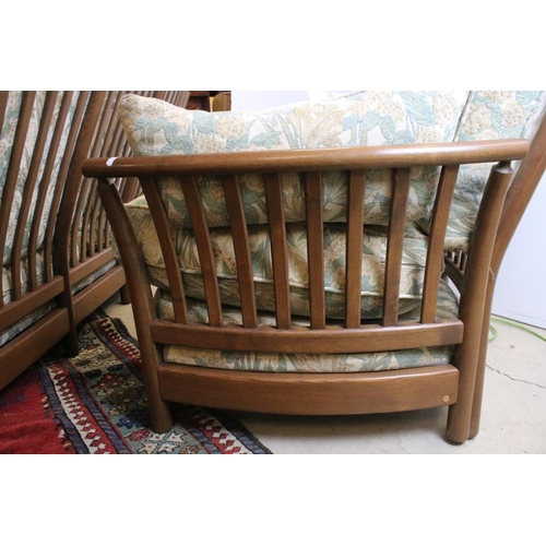 557 - Ercol ' Renaissance ' Elm High Back Three Piece Suite with floral pattern upholstery comprising Sofa... 