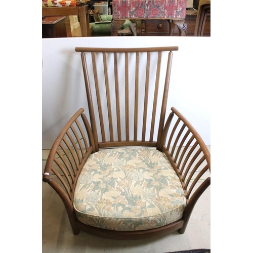 557 - Ercol ' Renaissance ' Elm High Back Three Piece Suite with floral pattern upholstery comprising Sofa... 