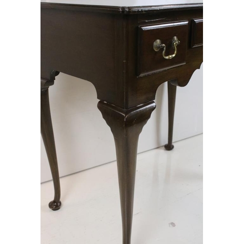 561 - George III style Mahogany Low Boy with three short drawers and shaped apron, raised on cabriole legs... 