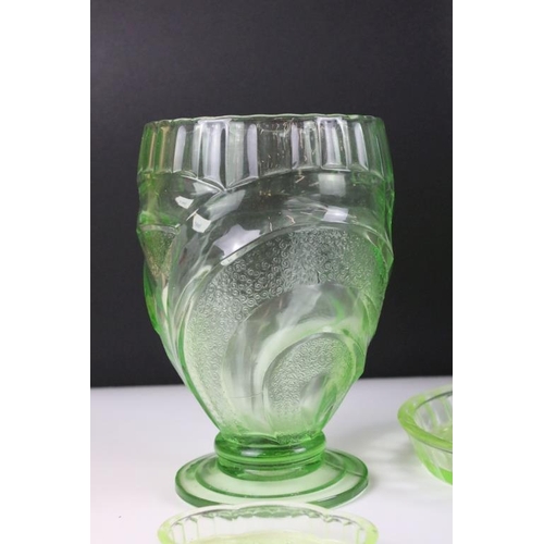 59 - Art Deco uranium green pressed glass dressing table set, together with a pressed glass vase. Vase me... 