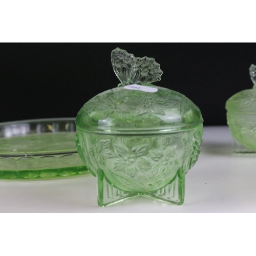 59 - Art Deco uranium green pressed glass dressing table set, together with a pressed glass vase. Vase me... 