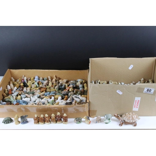 60 - Large and extensive collection of Wade whimsies including a large tortoise. Two boxes.