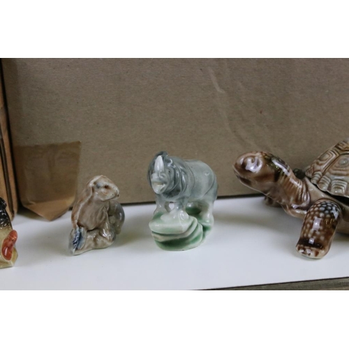 60 - Large and extensive collection of Wade whimsies including a large tortoise. Two boxes.