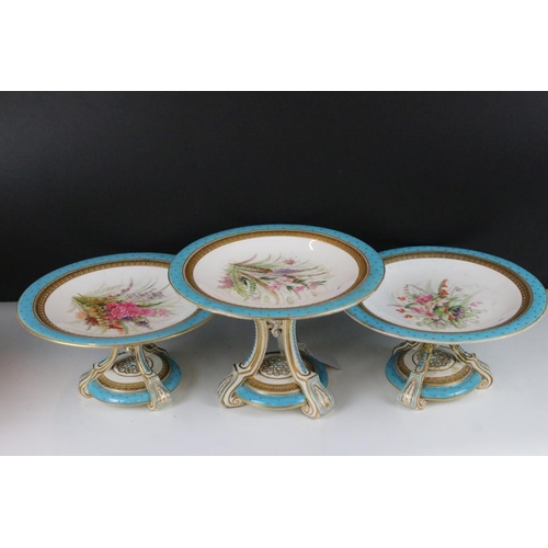 63 - Four 19th Century Royal Worcester tazza's having hand painted floral sprays to the plates with blue ... 