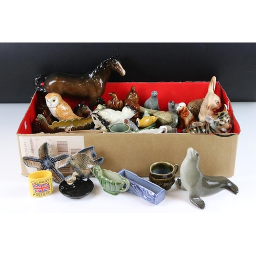 71 - Collection of Wade whimsies, Wade whisky bottles, Beswick horses, Beswick animal figurines, two USSR... 