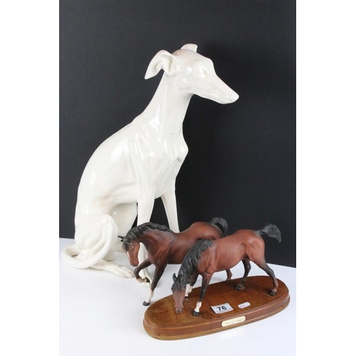 76 - Large ceramic figure of a seated Greyhound (50cm high), together with a Beswick matt brown horse mid... 