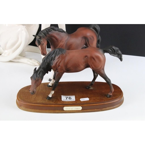 76 - Large ceramic figure of a seated Greyhound (50cm high), together with a Beswick matt brown horse mid... 