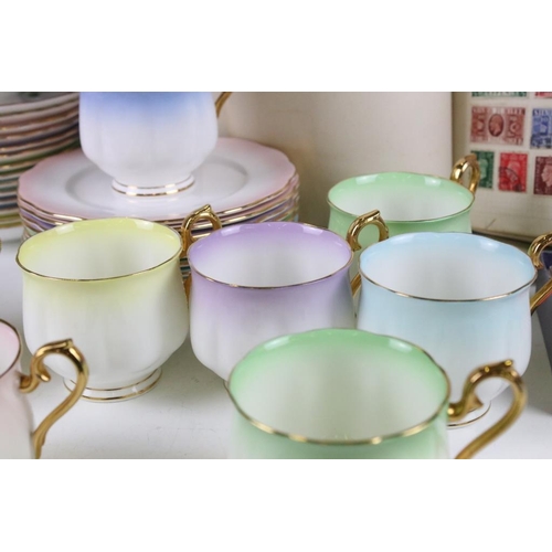 83 - Royal Albert 'Rainbow' tea set for 12 to include 12 cups, 12 saucers & 12 tea plates, plus a Royal A... 