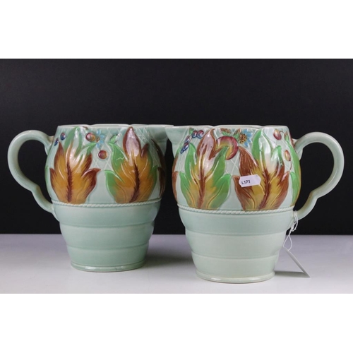 87 - Group of Clarice Cliff ceramics, 5 pieces, to include a pair of Newport Pottery 'Celtic Leaf and Ber... 