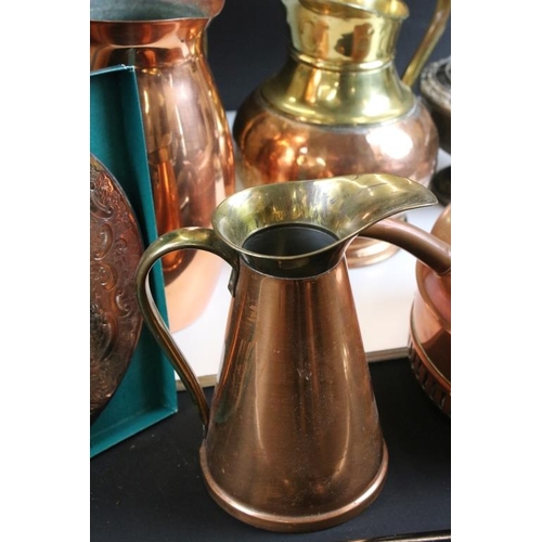 327 - Assorted metal wares to include a silver topped walking stick, copper kettle and jugs, coffee pot, t... 