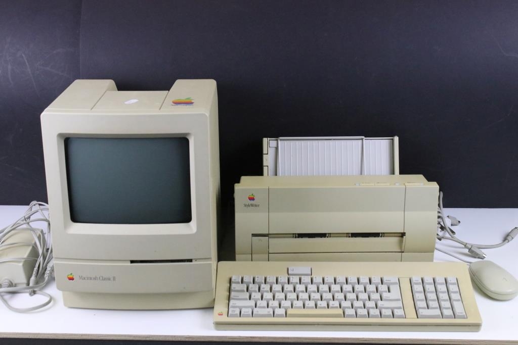 Apple Macintosh Classic II M4150 computer together with an Apple  StyleWriter M8000 and key board.