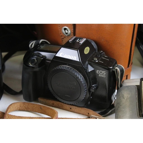 333 - Collection of cameras and related equipment to include a Pentax ME super camera with a 35-70mm lens,... 