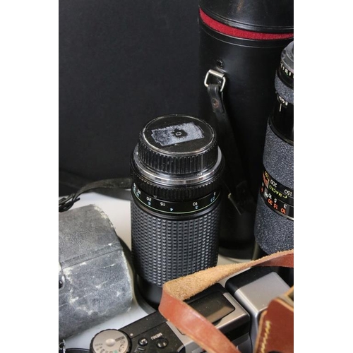 333 - Collection of cameras and related equipment to include a Pentax ME super camera with a 35-70mm lens,... 