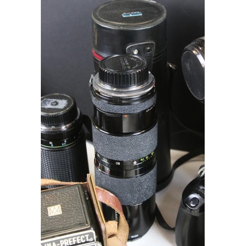 333 - Collection of cameras and related equipment to include a Pentax ME super camera with a 35-70mm lens,... 